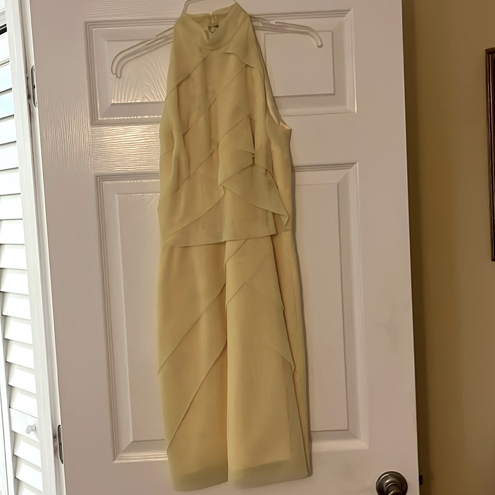 K O EL size 4. Midi length. Light yellow layers of ruffles.